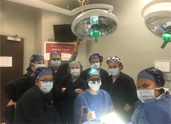 Dr. Malena Amato's surgical team, wearing scrubs and masks